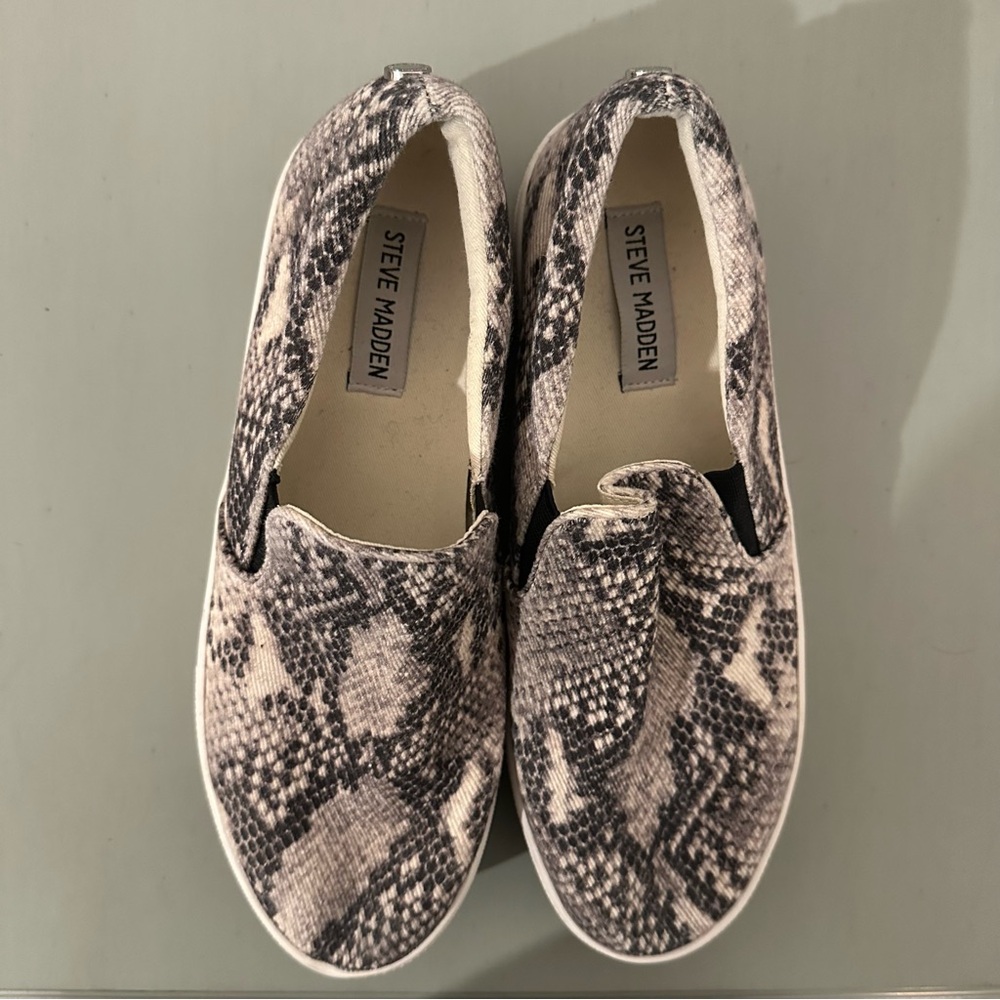 SOLD: Steve Madden “Gills” Black and Cream Snake Print Slip-Ons